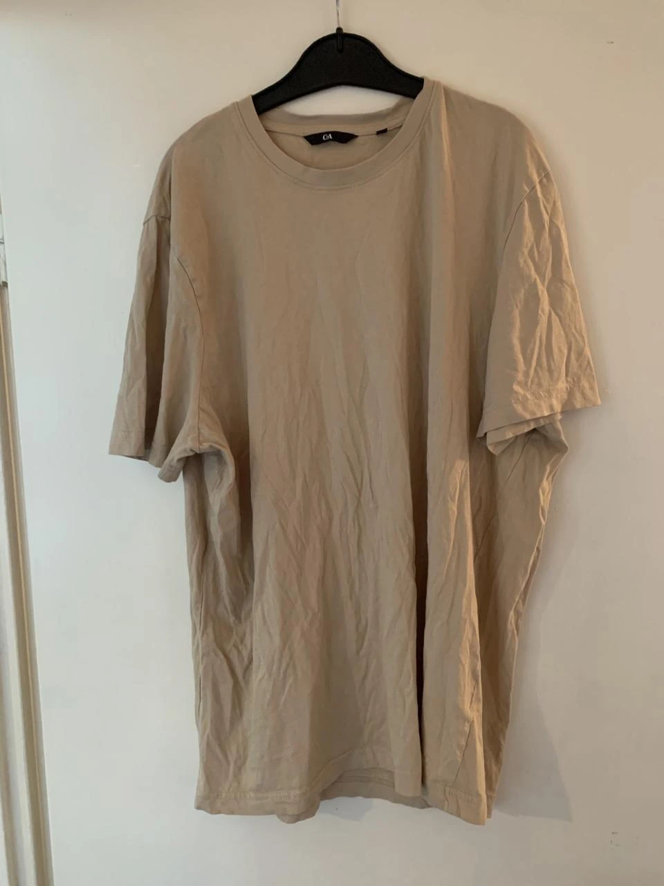 Beige T-shirt van de C&A. Maat L.